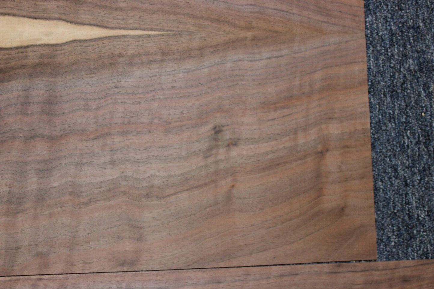 Flame figured black walnut dreadnought size guitar back and side set.