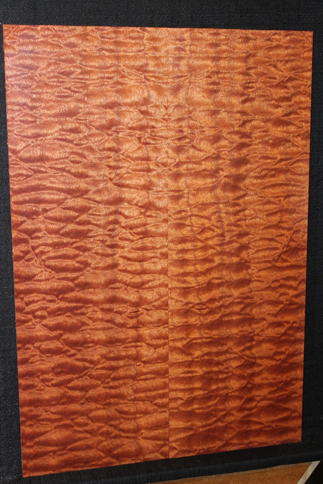 Quilted sapele electric guitar bookmatched drop top. Master grade figure.