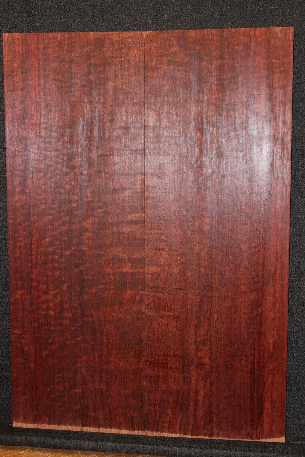 Figured bubinga electric guitar drop top. Curly / pomelle figure & rich color.