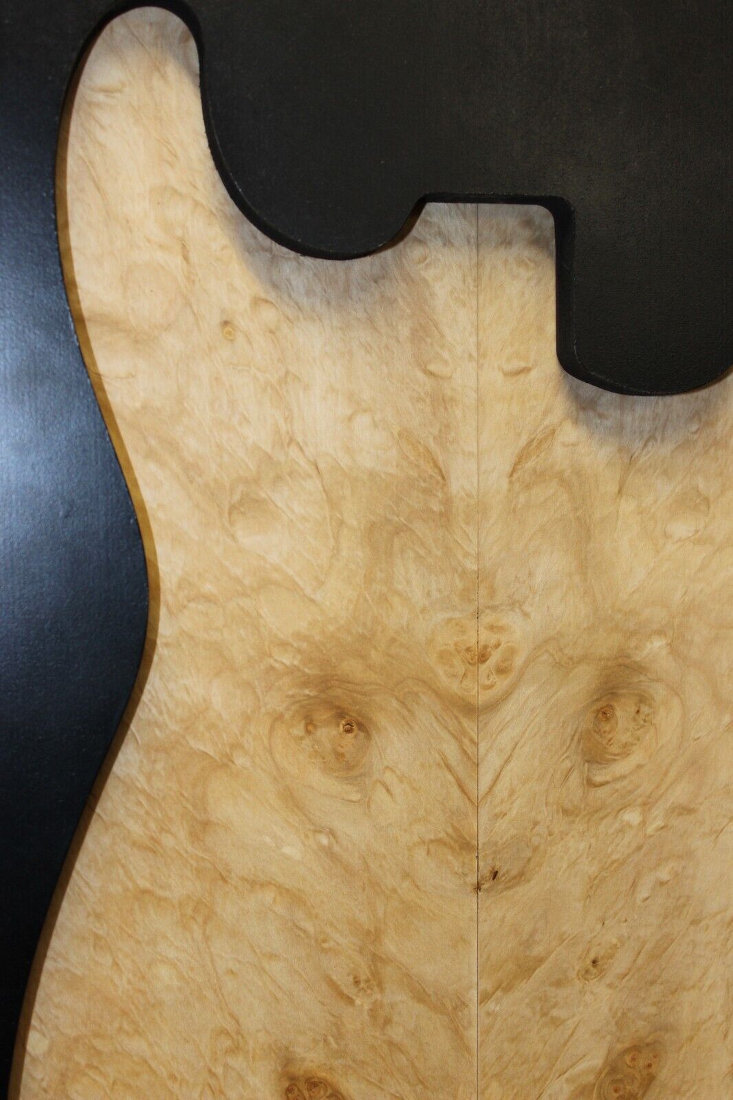 Silver maple, burl / lace figured guitar book matched top.