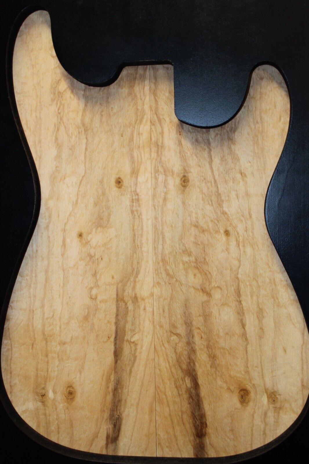 Silver maple, burl / lace figured guitar book matched top.