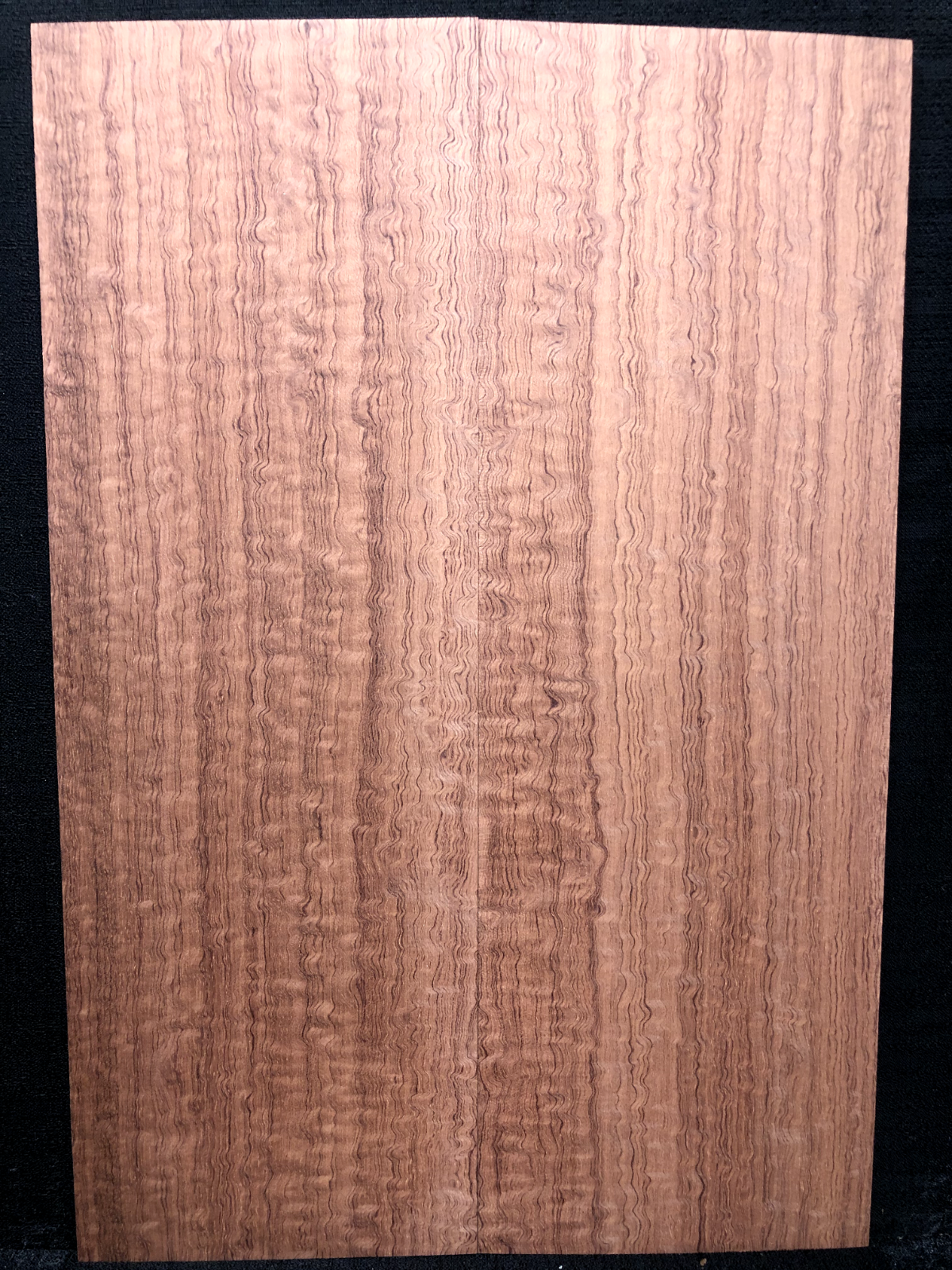Figured quarter sawn bubinga guitar drop top.