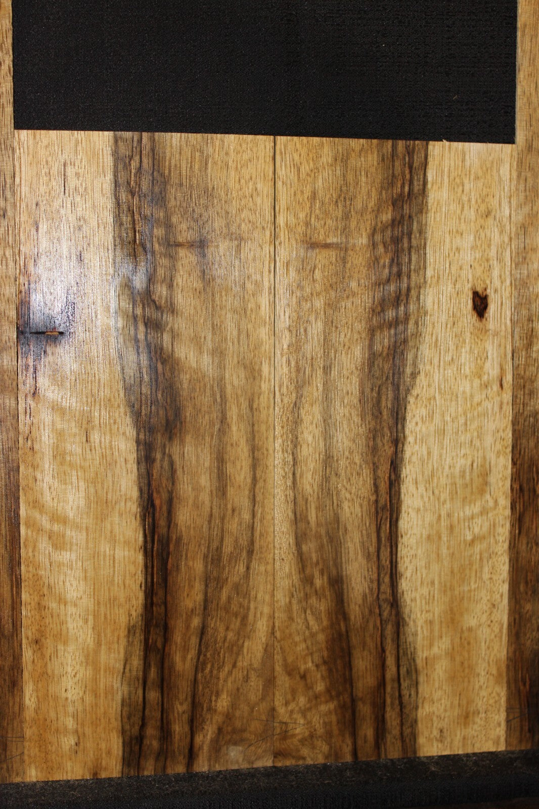 Quarter sawn black limba / korina ukulele back and side set. Tenor size