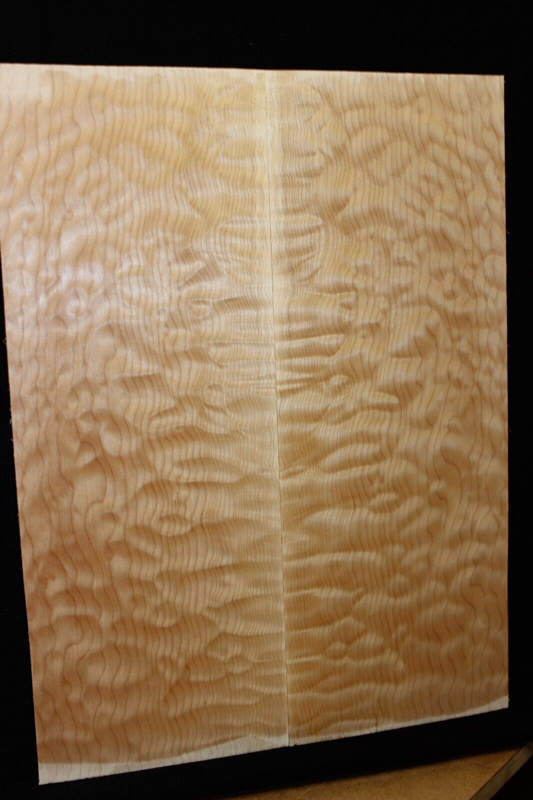 Quilted maple book matched guitar drop top.