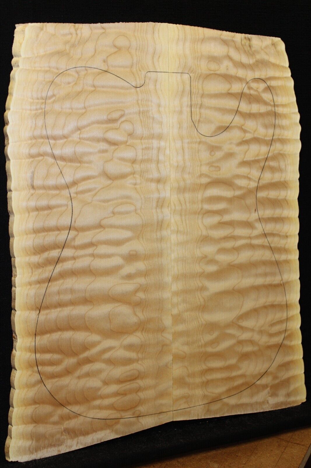 Quilted maple book matched guitar drop top. 5A figure, telly size