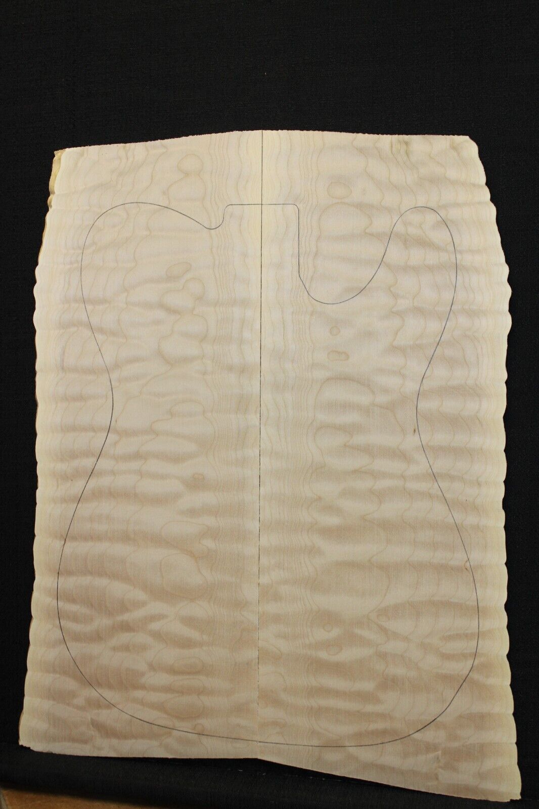 Quilted maple book matched guitar drop top. 5A figure, telly size