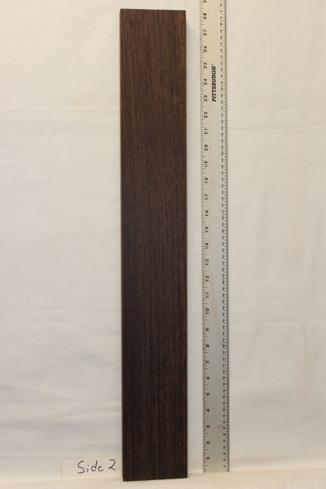 Wenge guitar neck blank. Nice straight vertical grain.