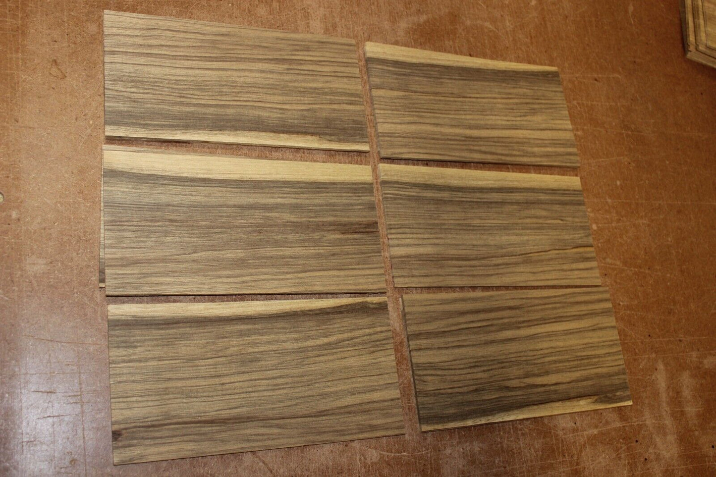 Quarter sawn black limba, korina headstock / peg head veneer. Sold individually