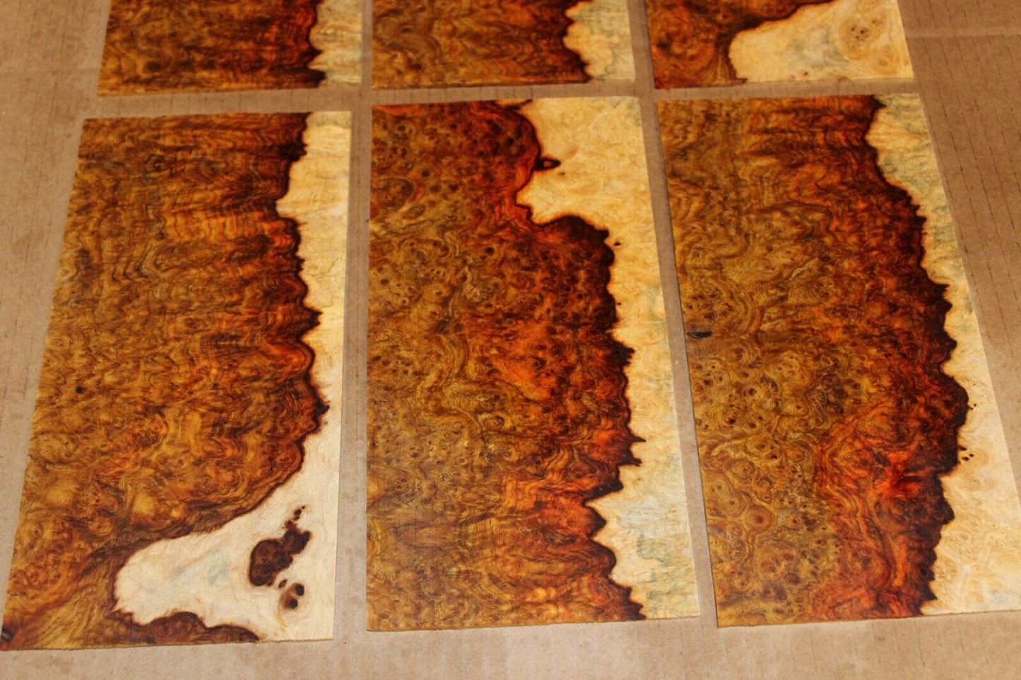 Amboyna burl headstock / peg head veneer. Sold individually