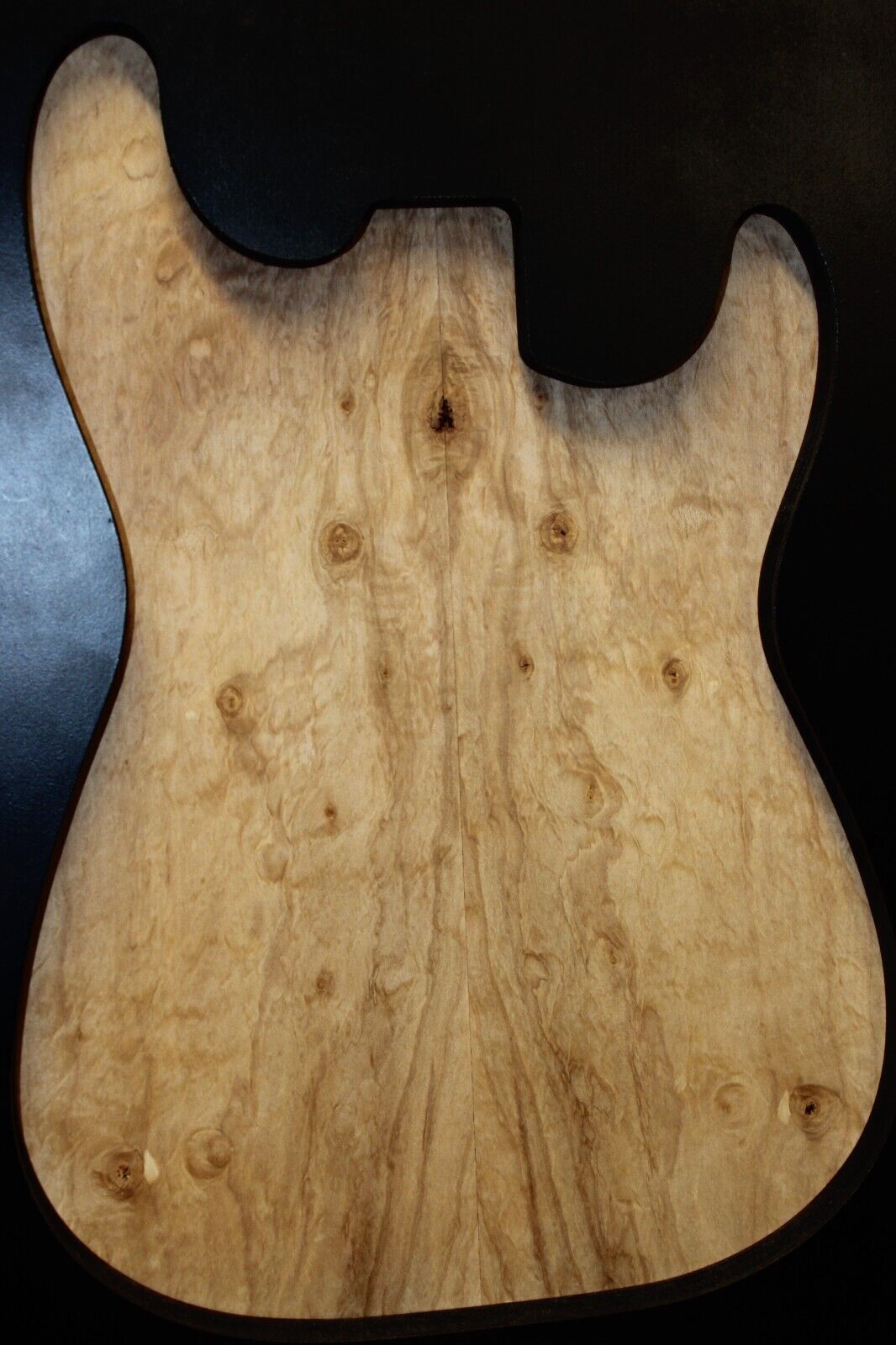 Silver maple, burl / lace figured guitar book matched top.