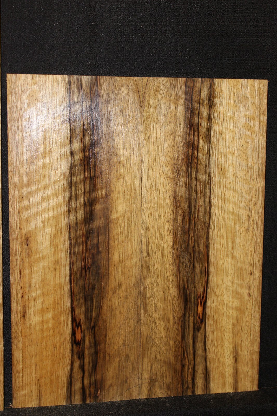 Quarter sawn black limba / korina ukulele back and side set. Tenor size