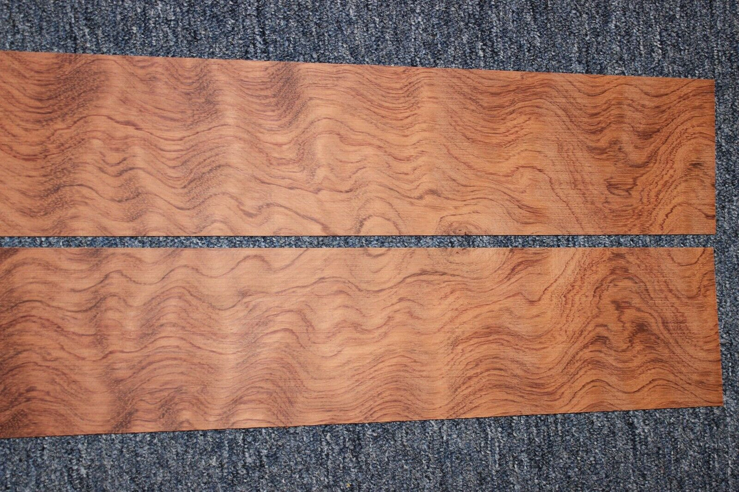 Waterfall figured bubinga back and side set. Stunning grain, color and figure.