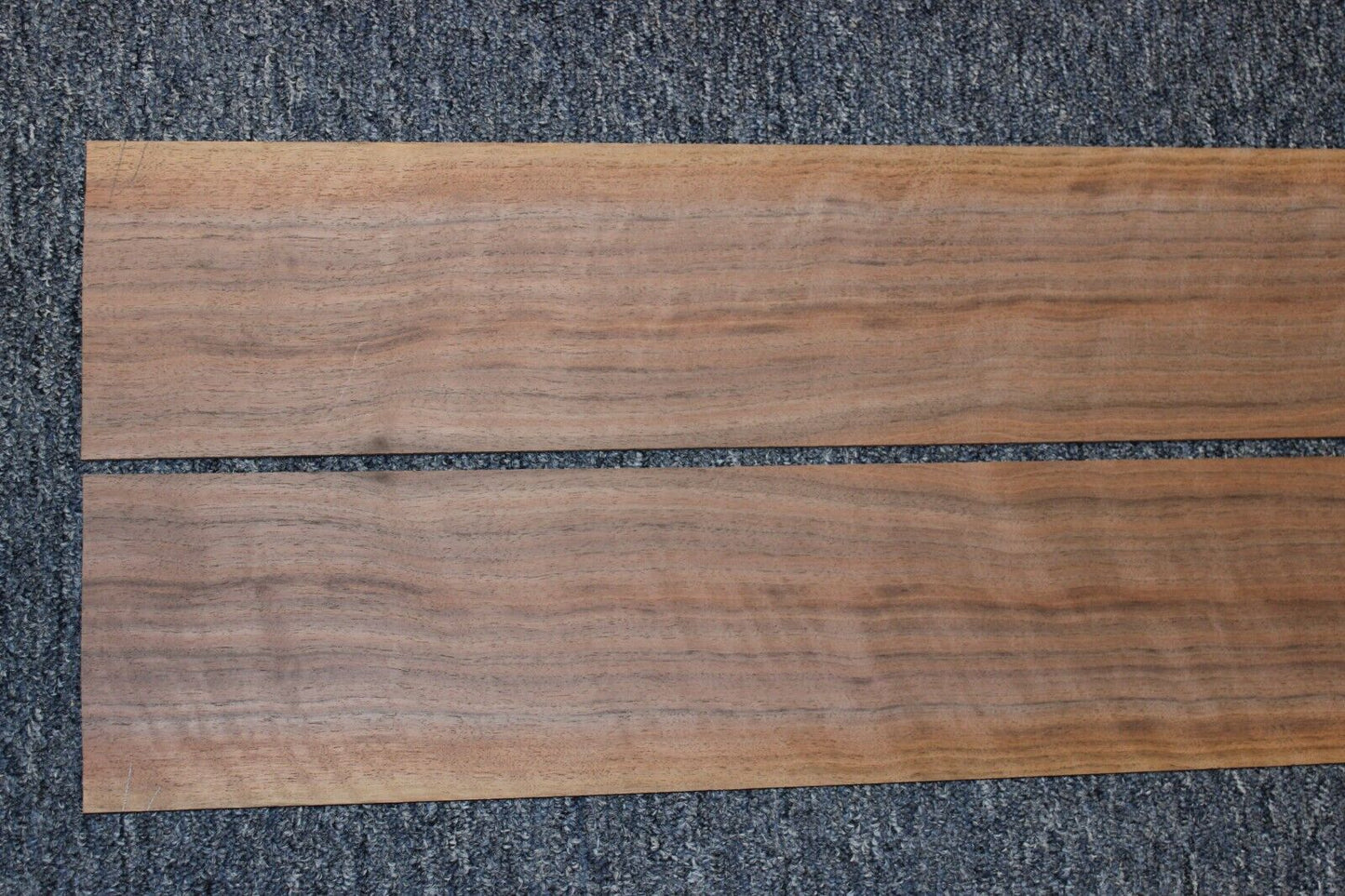 Flame figured black walnut dreadnought size guitar back and side set.