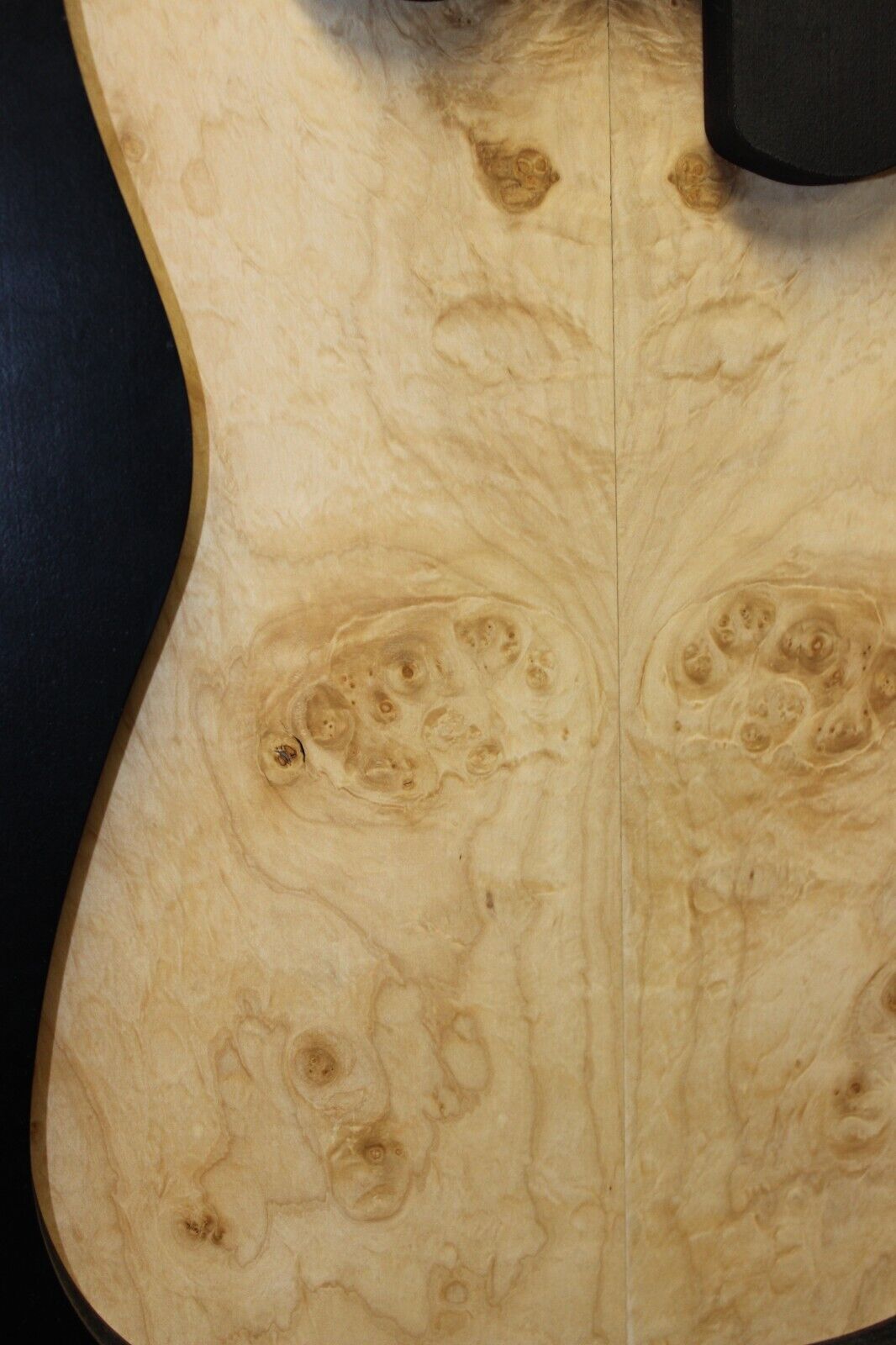 Silver maple, burl / lace figured guitar book matched top.