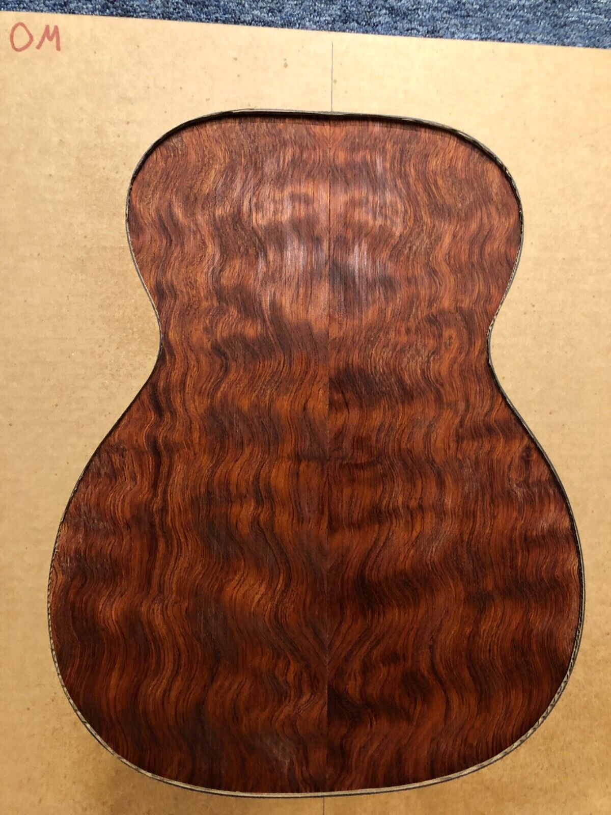 Waterfall figured bubinga back and side set. Stunning grain, color and figure.