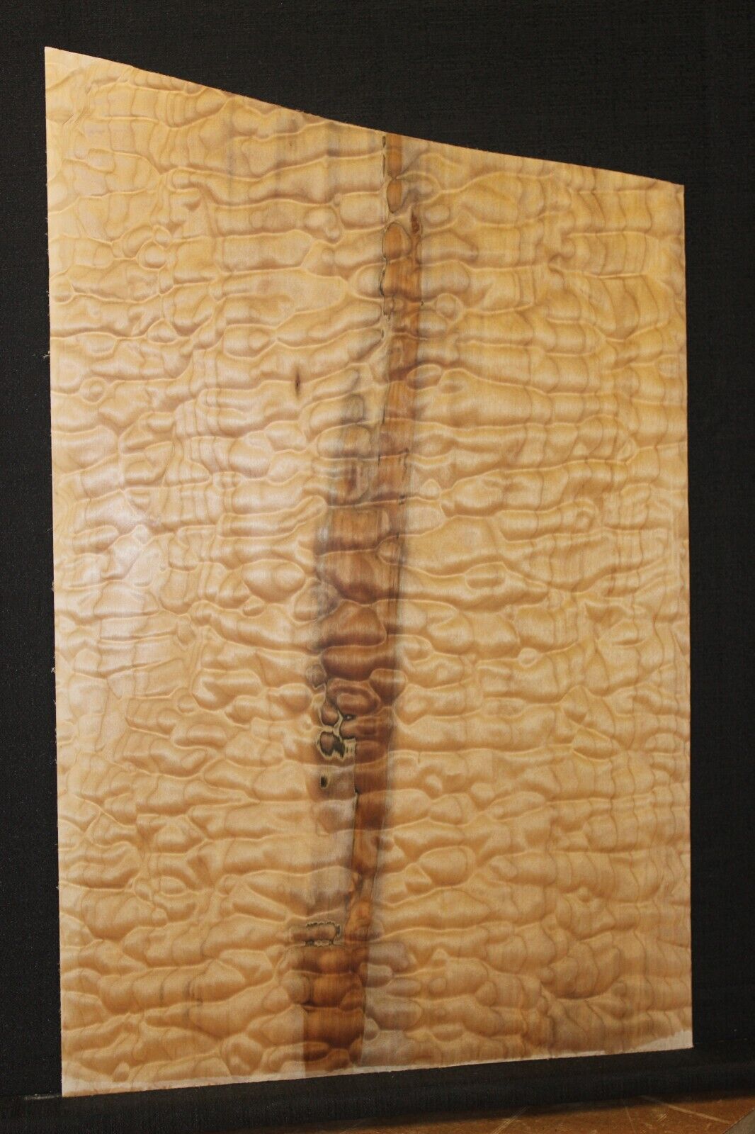 One piece quilted maple guitar drop top. 5A figure with flaws