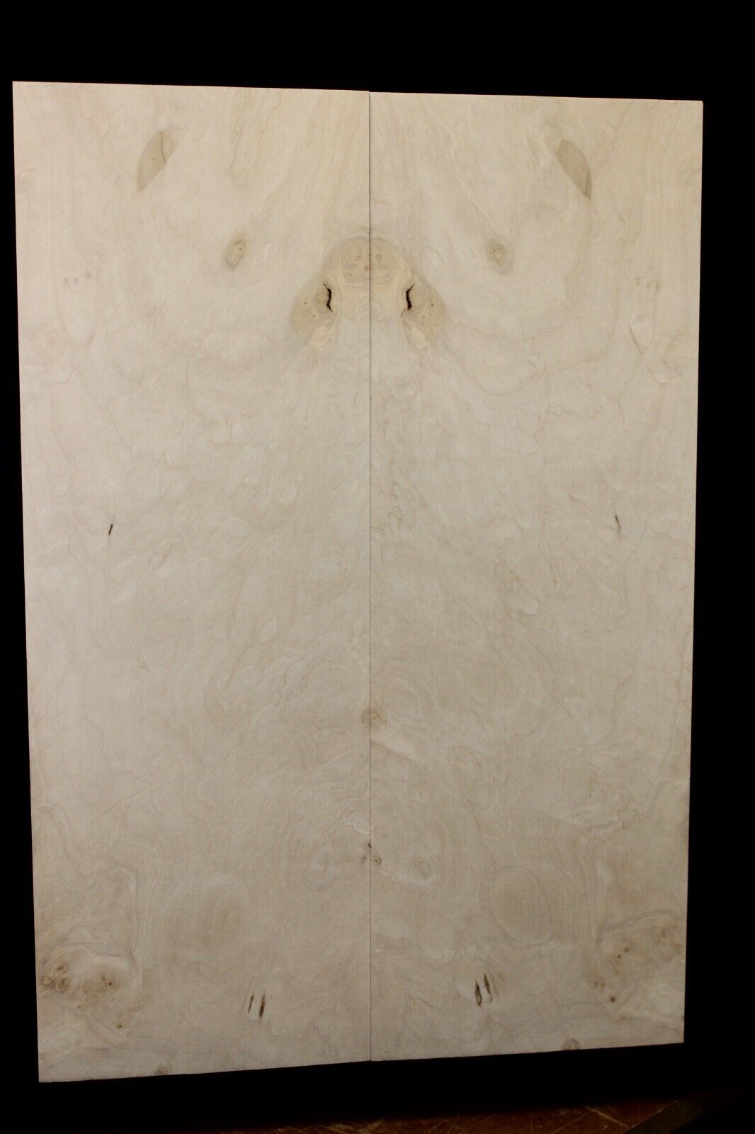 Silver maple, burl / lace figured guitar book matched top.