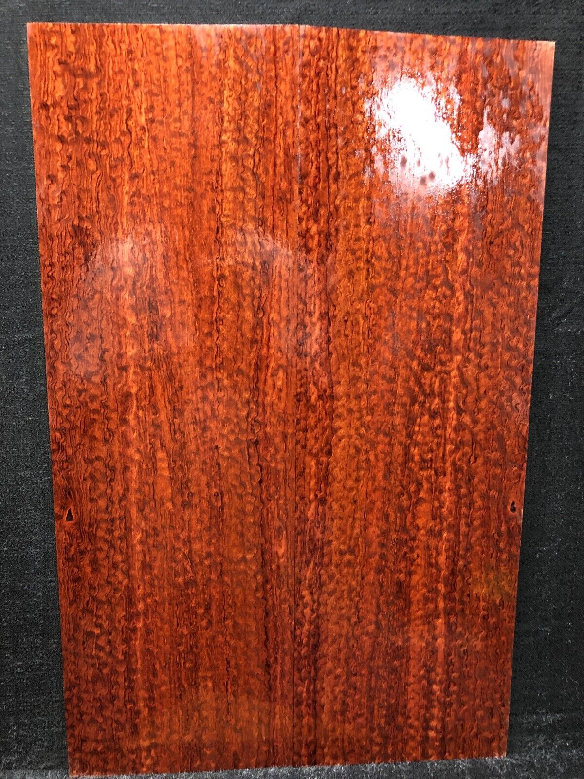 Pomelle figured bubinga electric guitar drop top.