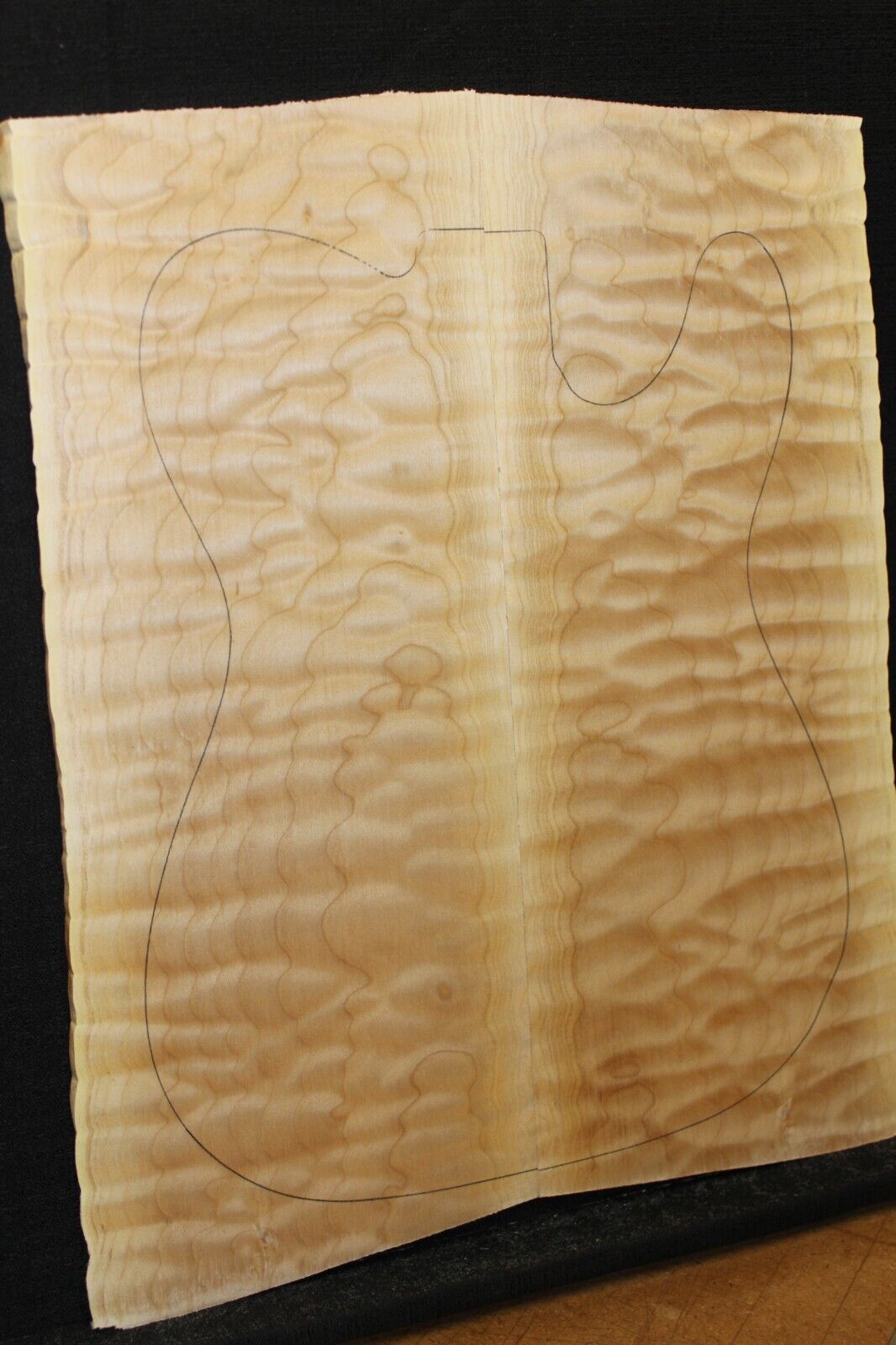 Quilted maple book matched guitar drop top. 5A figure, telly size