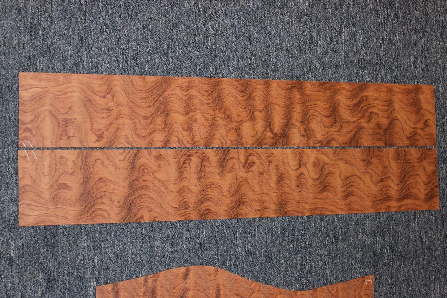 Waterfall figured bubinga back and side set. Stunning grain, color and figure.