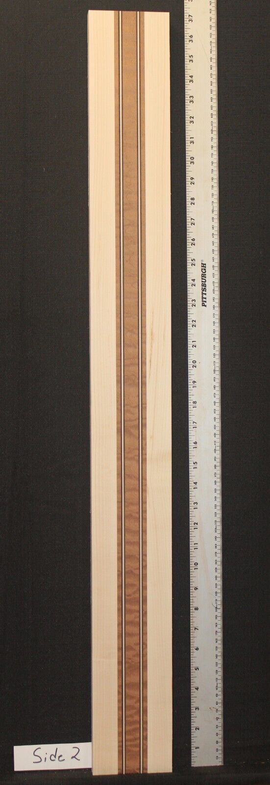 Quilted sapele, hard maple and wenge laminated bass guitar neck blank