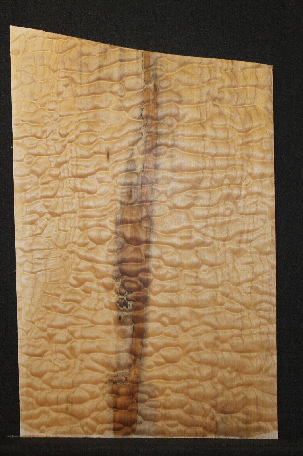 One piece quilted maple guitar drop top. 5A figure with flaws