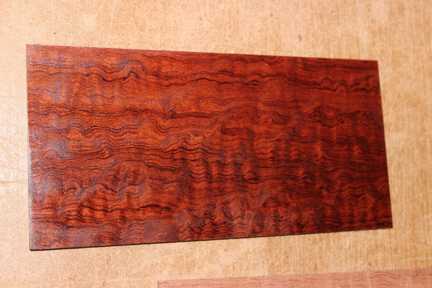 Quarter sawn figured bubinga headstock / peg head veneer. Sold individually