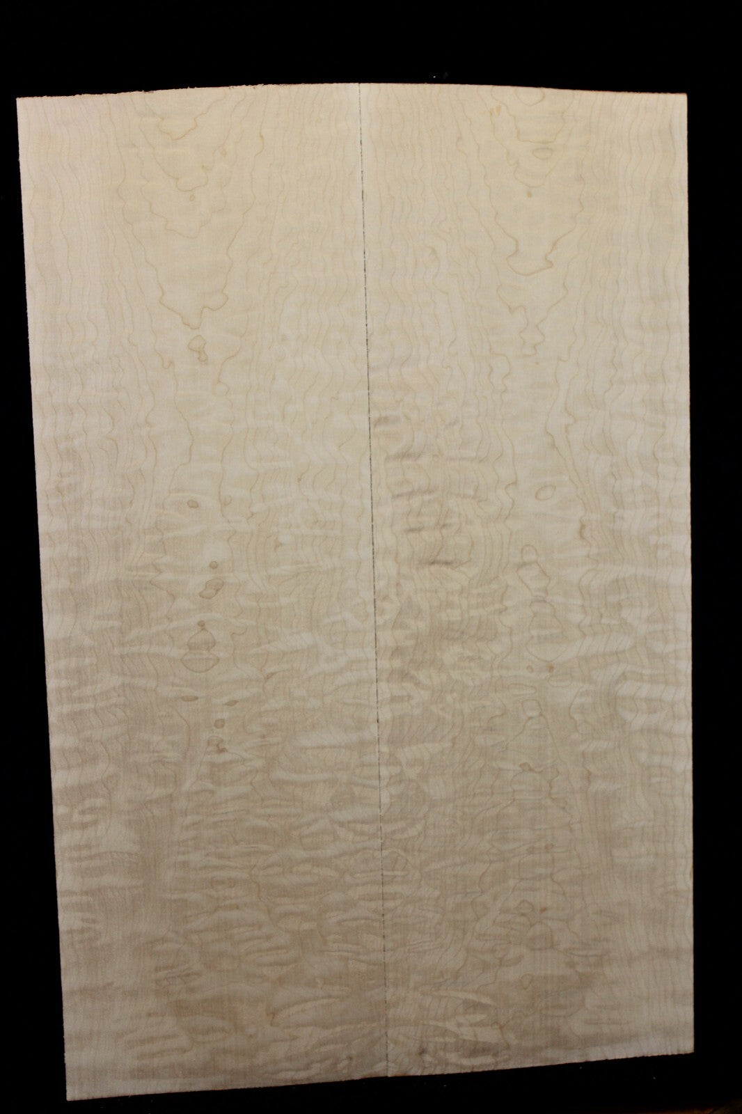 Quilted maple book matched guitar drop top.