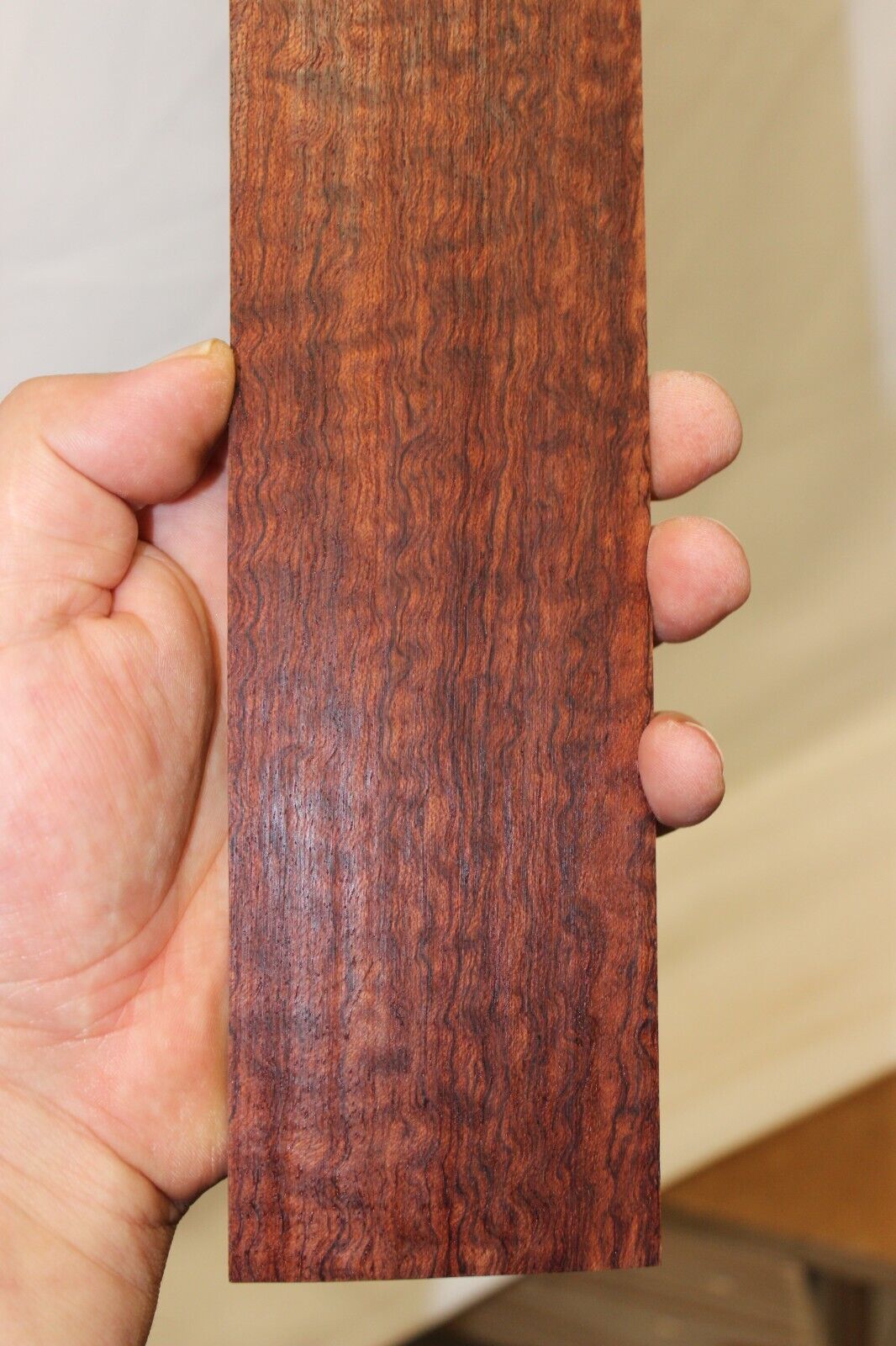 12 inch radius figured bubinga guitar fingerboard blank.