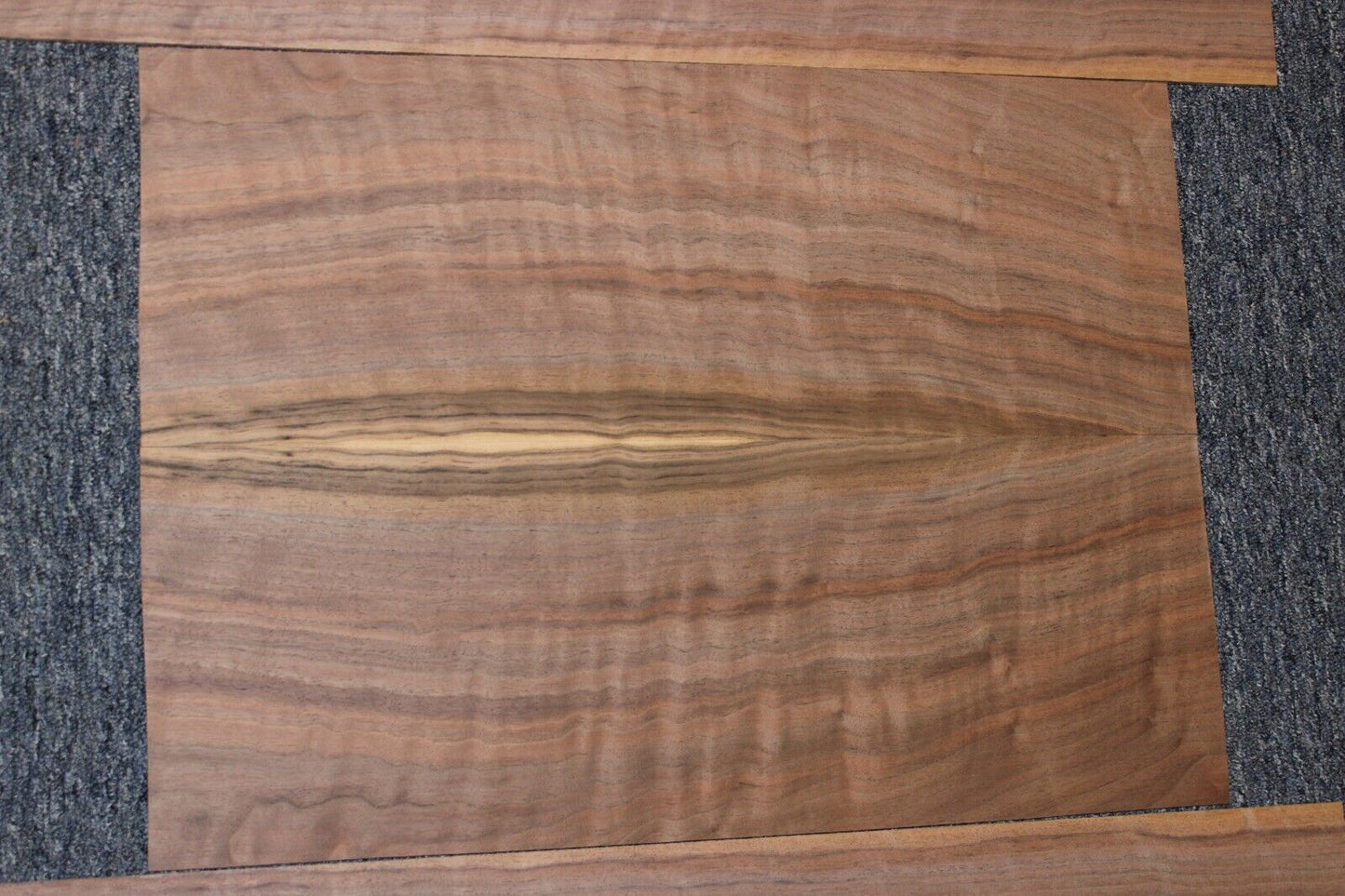 Flame figured black walnut dreadnought size guitar back and side set.