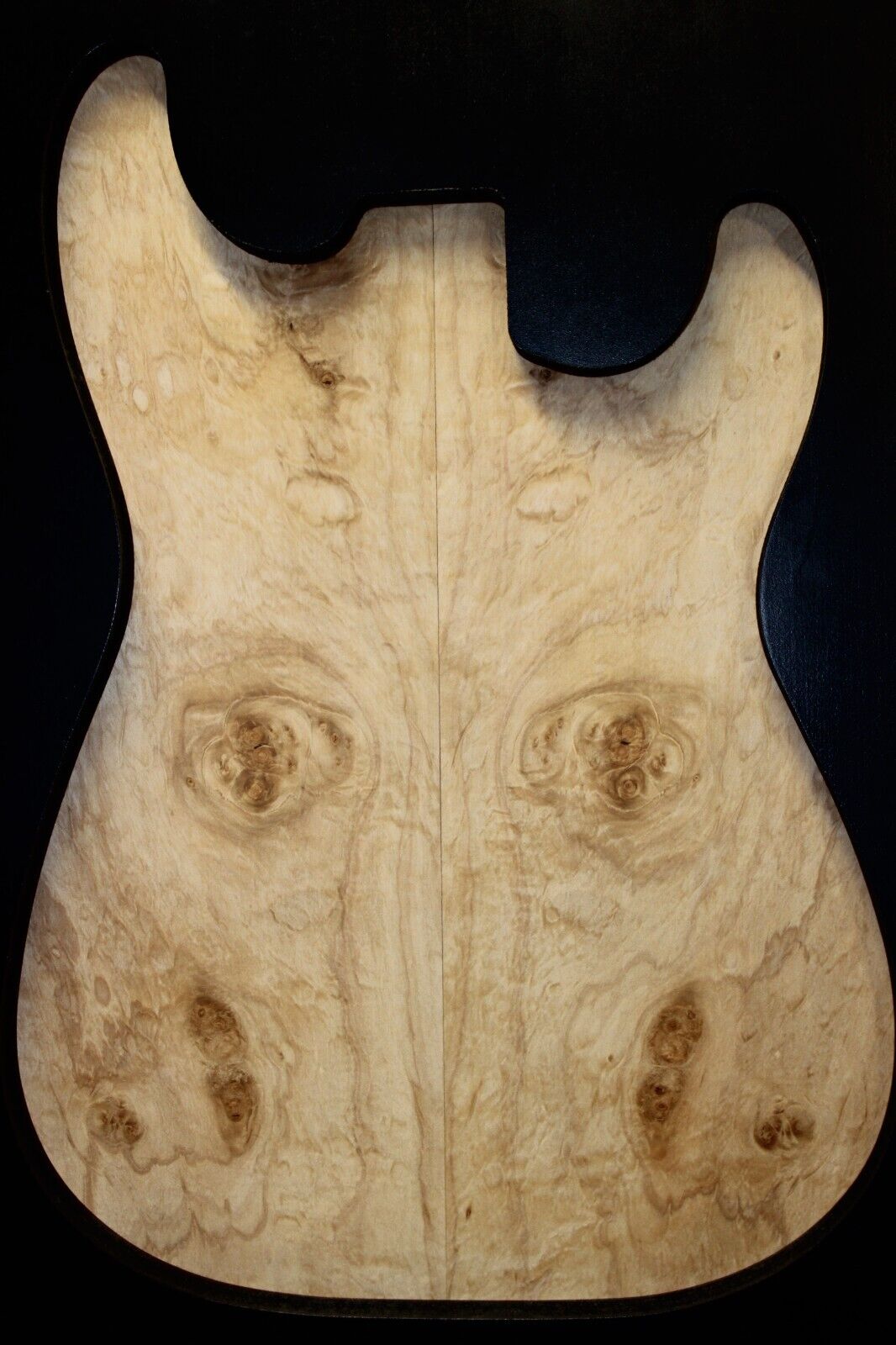 Silver maple, burl / lace figured guitar book matched top.