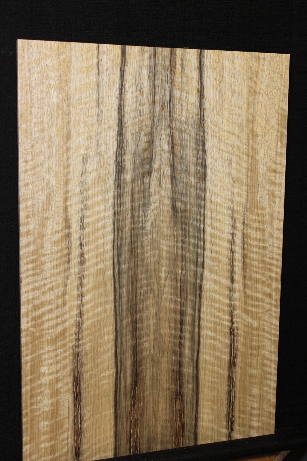 Curly black limba / korina figured book matched guitar top. 0.37" thick