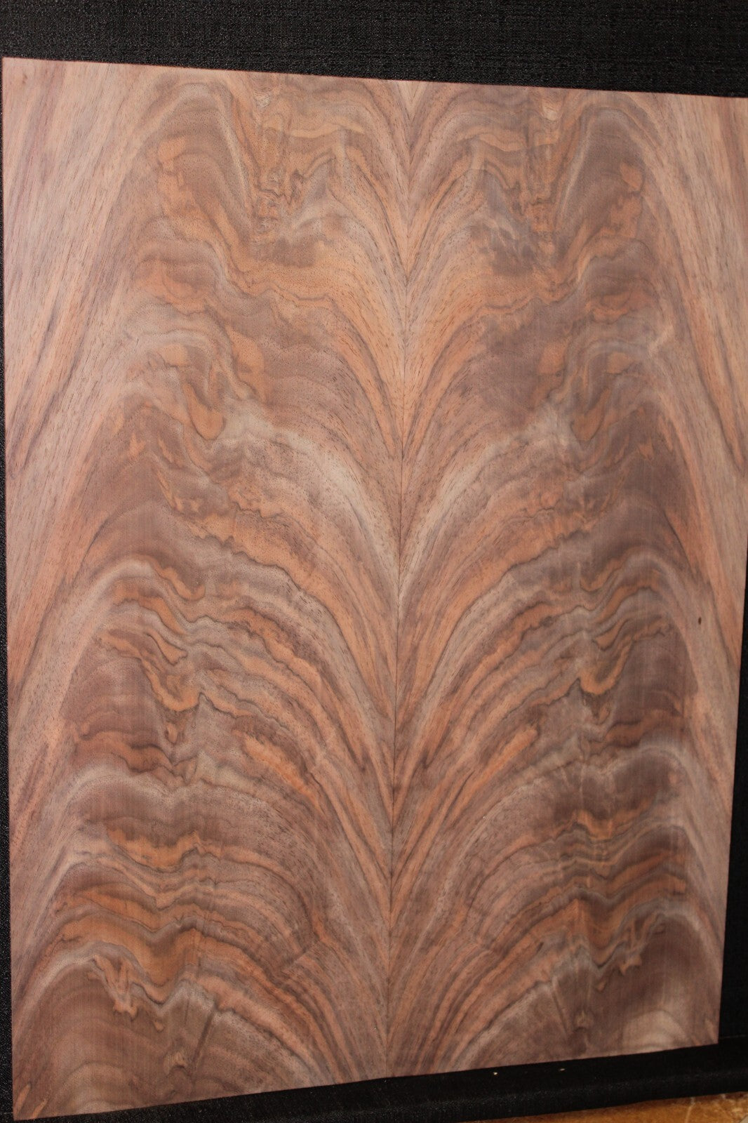 Black walnut crotch figured book matched guitar top.