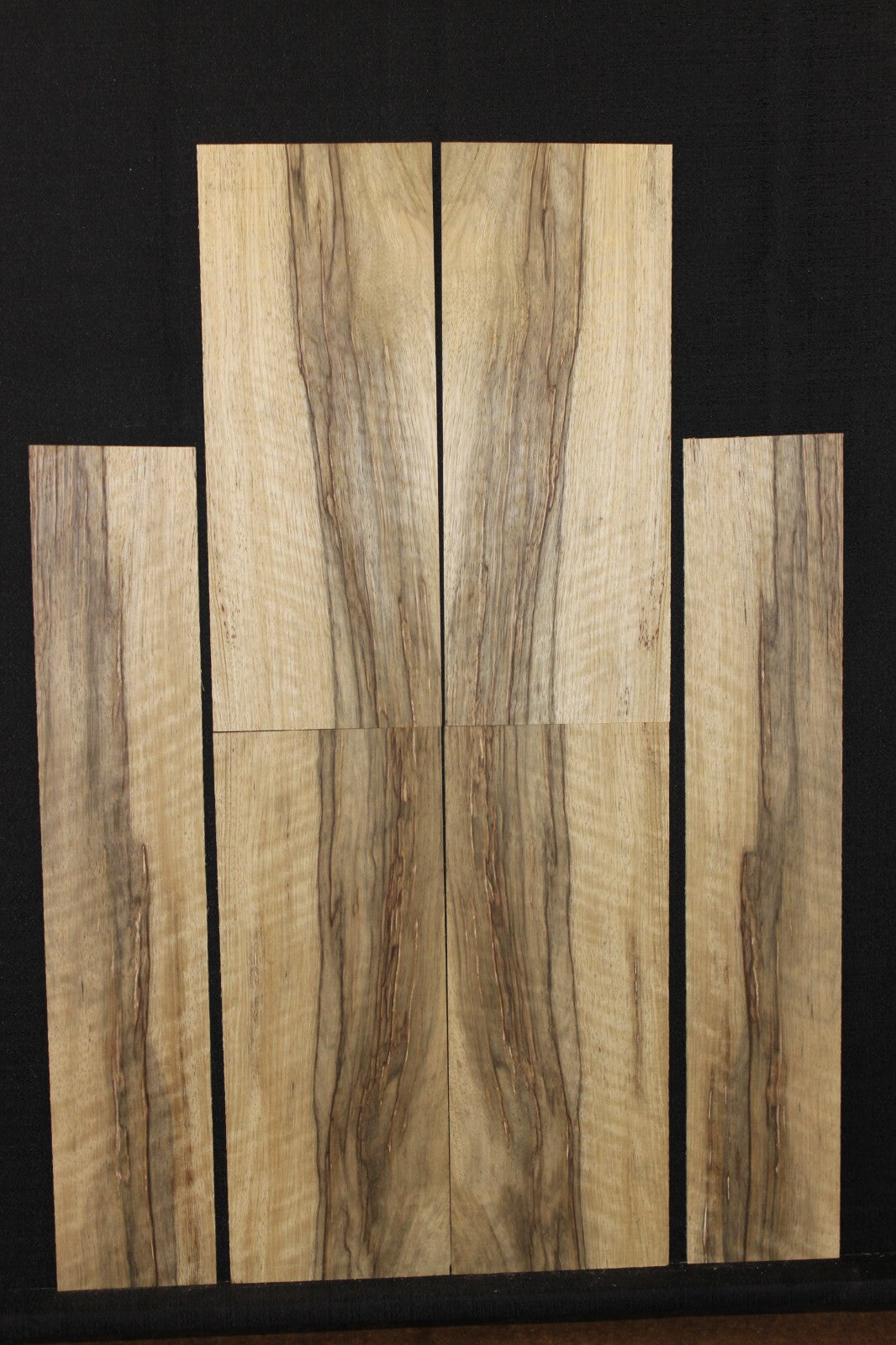 Quarter sawn figured black limba ukulele back, top and side set. Tenor size