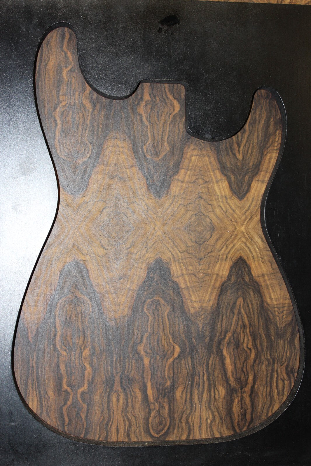 Multi book match black limba END GRAIN electric guitar top.
