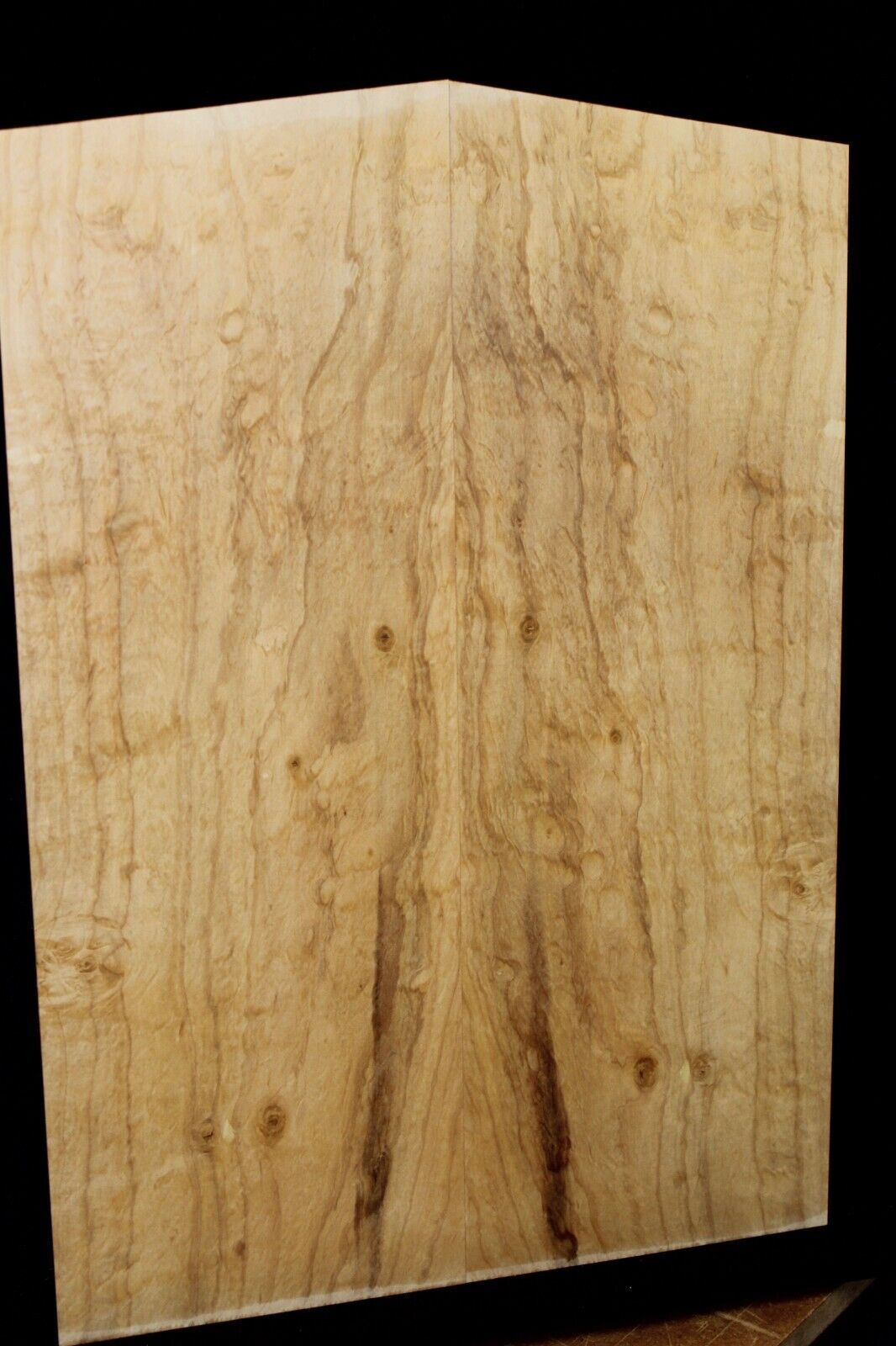 Silver maple, burl / lace figured guitar book matched top.