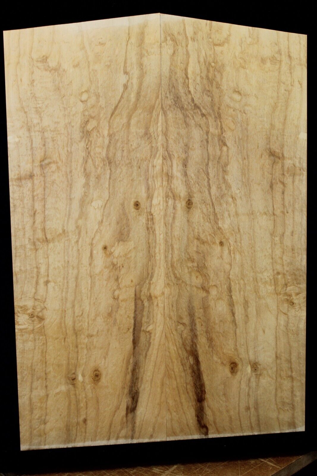 Silver maple, burl / lace figured guitar book matched top.