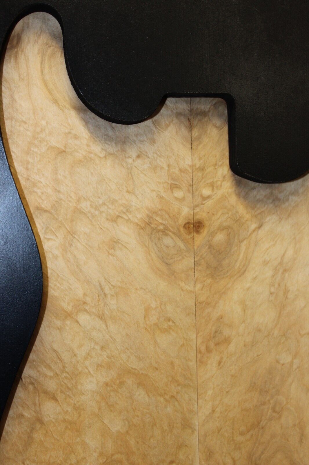 Silver maple, burl / lace figured guitar book matched top.
