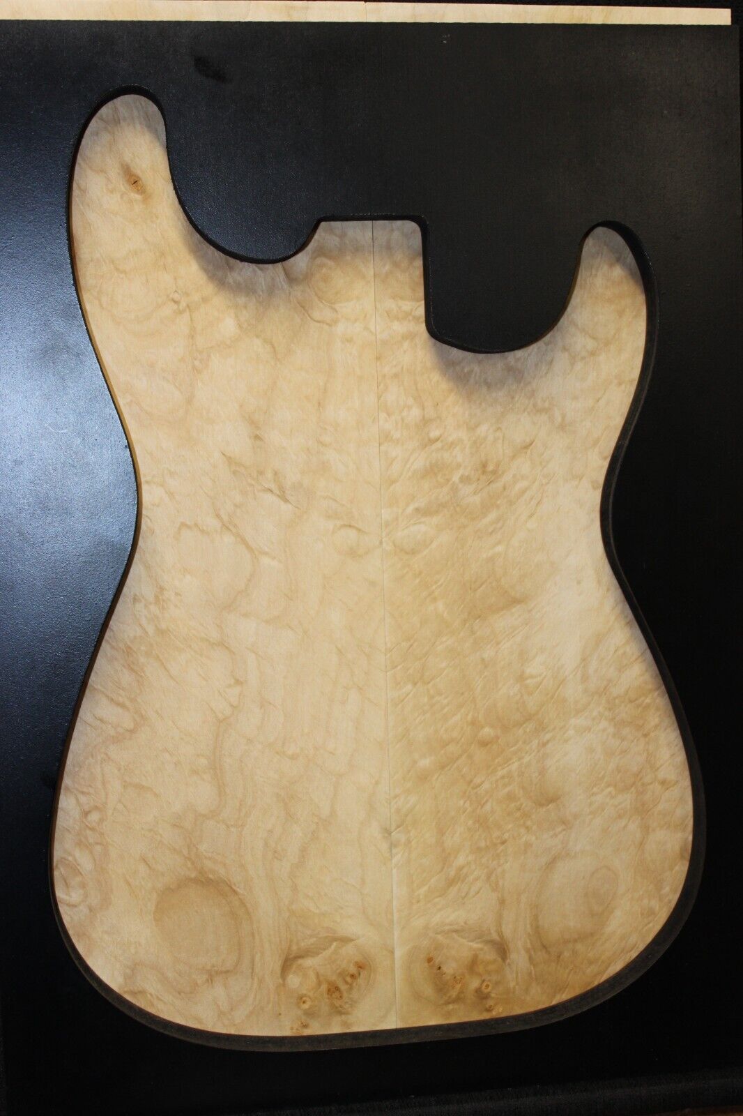 Silver maple, burl / lace figured guitar book matched top.