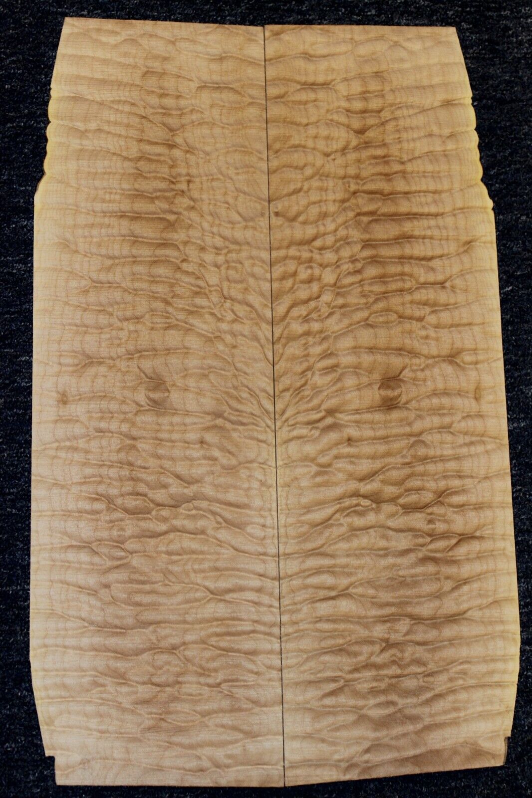 Quilted maple book matched guitar drop top. 5A figure