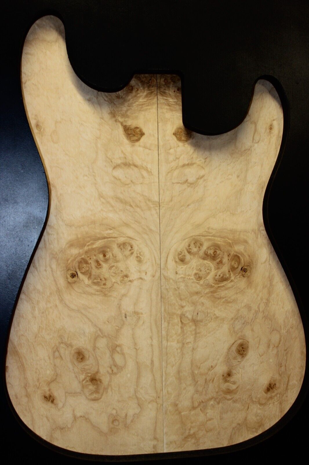 Silver maple, burl / lace figured guitar book matched top.