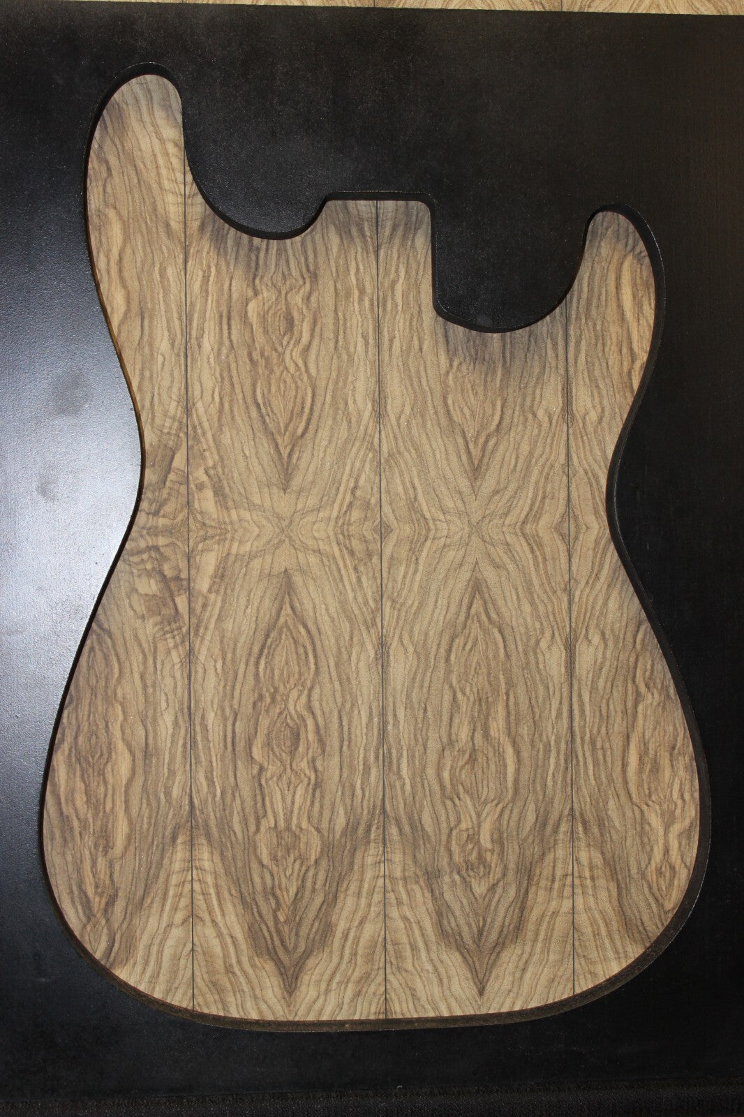Multi book match black limba END GRAIN electric guitar top.