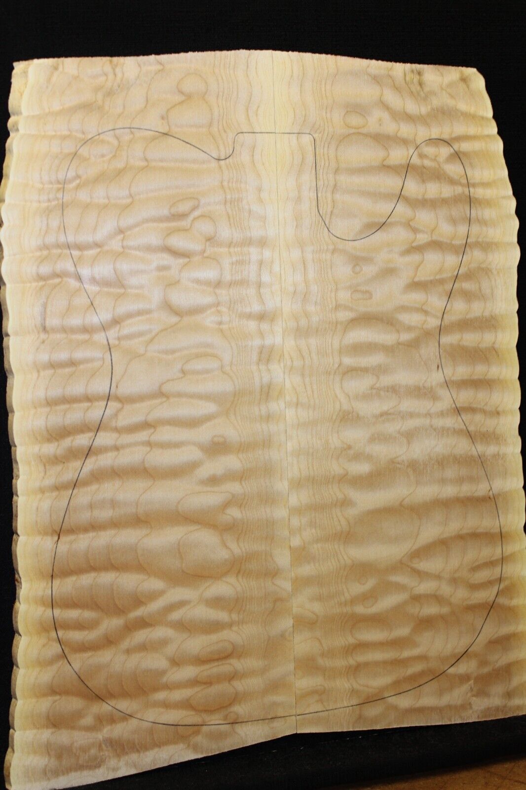 Quilted maple book matched guitar drop top. 5A figure, telly size