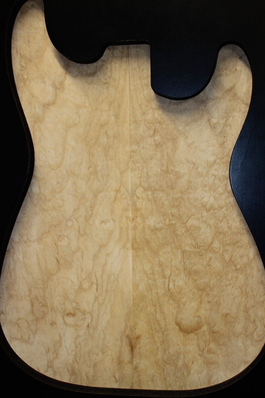 Silver maple, burl / lace figured guitar book matched top.