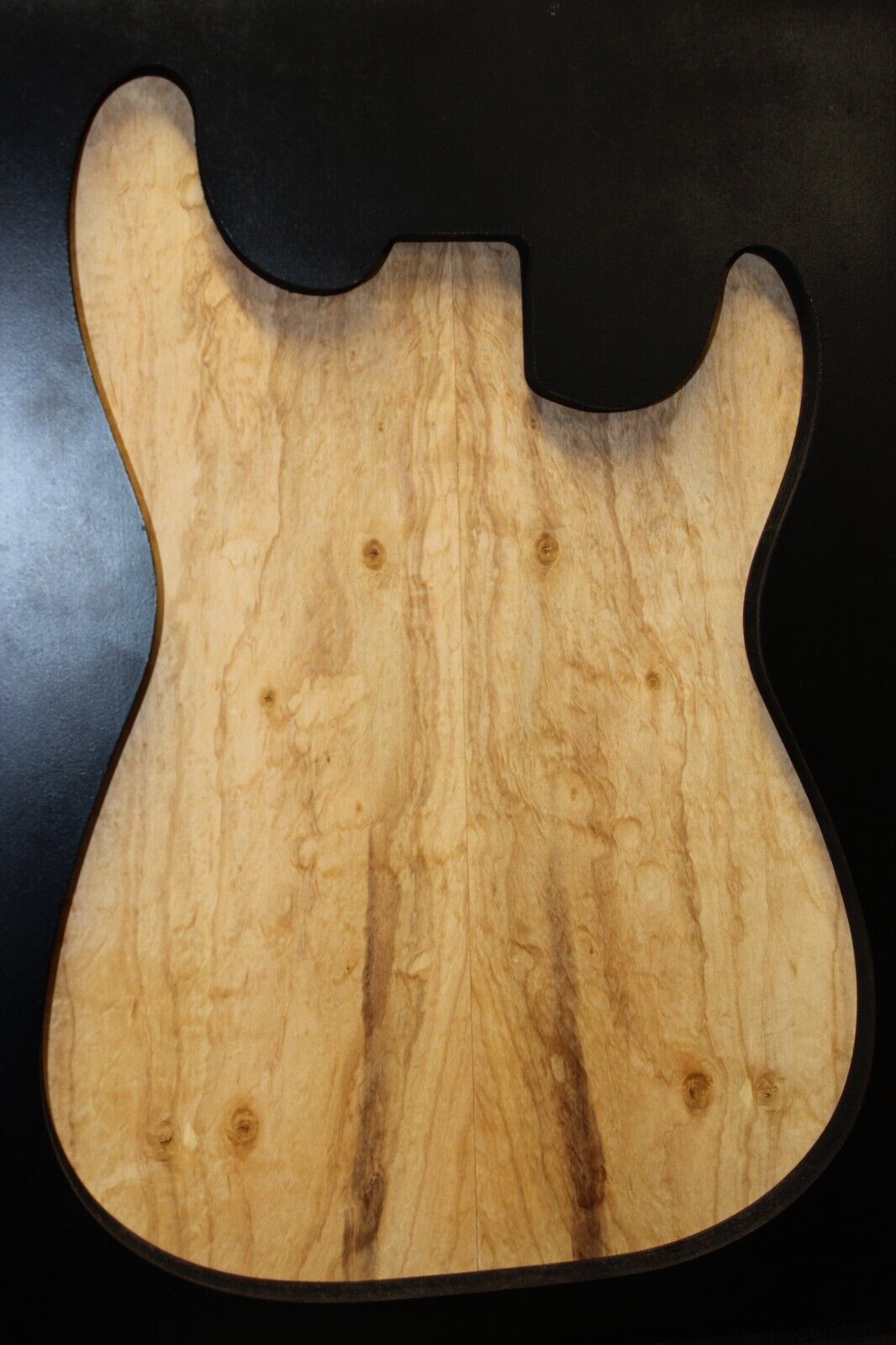Silver maple, burl / lace figured guitar book matched top.
