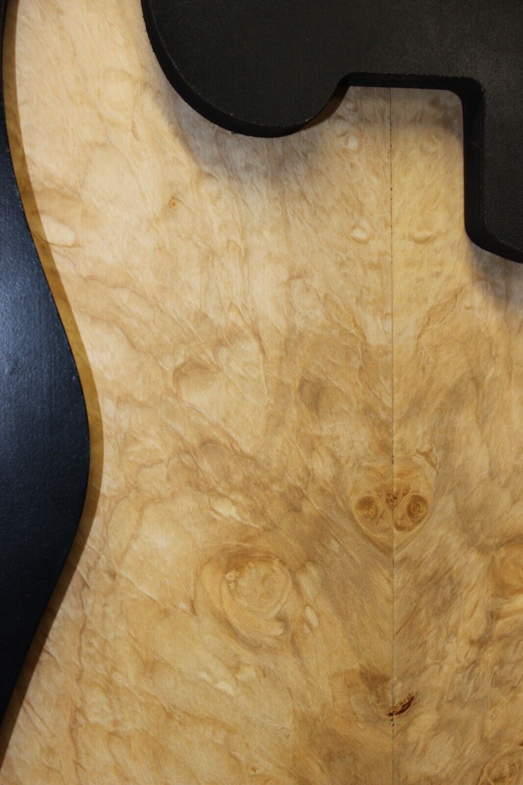Silver maple, burl / lace figured guitar book matched top.