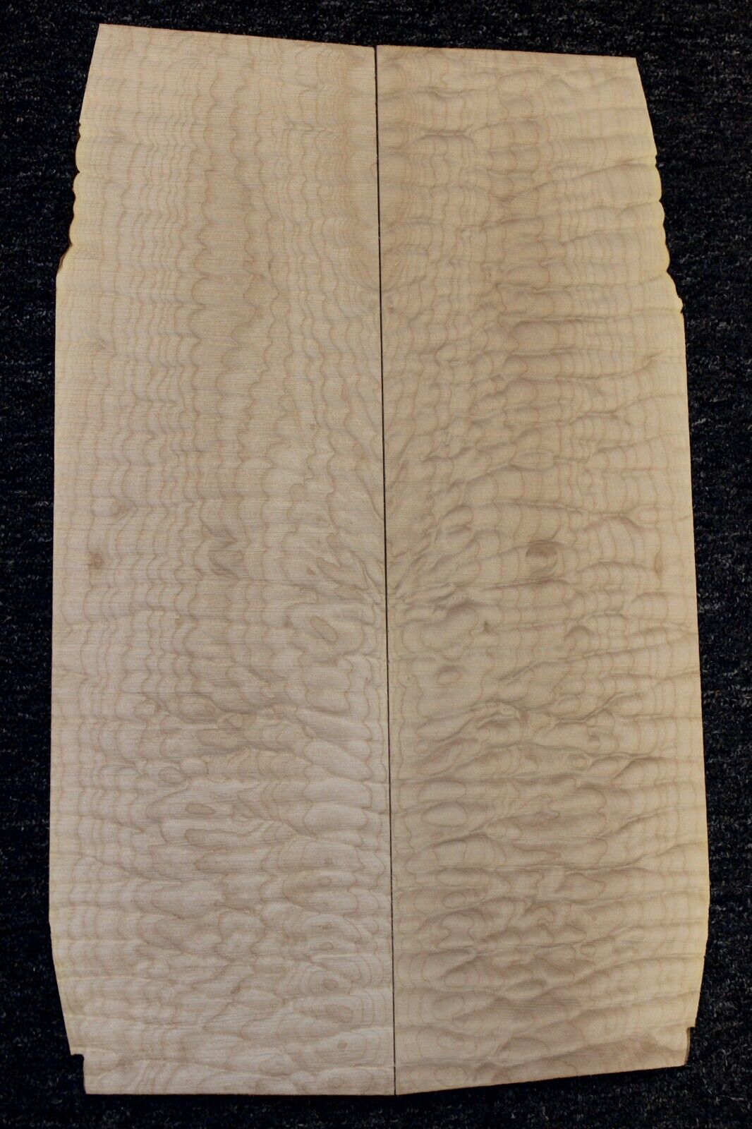 Quilted maple book matched guitar drop top. 5A figure