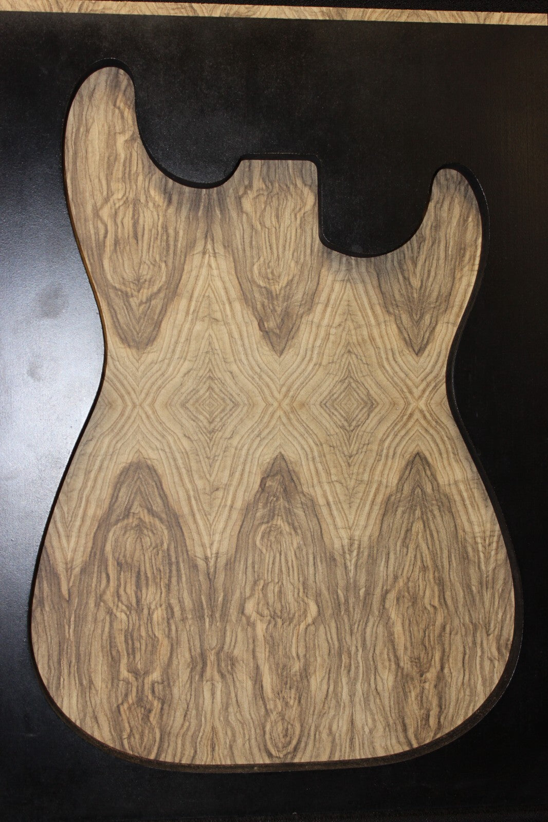 Multi book match black limba END GRAIN electric guitar top.