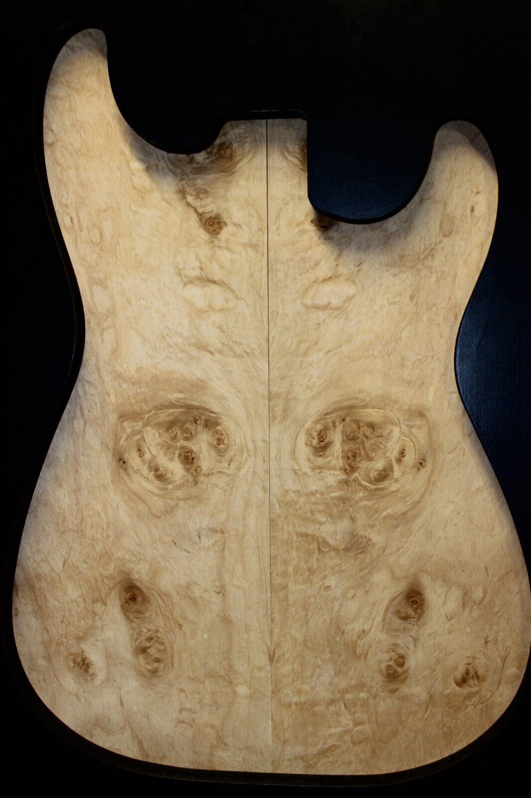 Silver maple, burl / lace figured guitar book matched top.