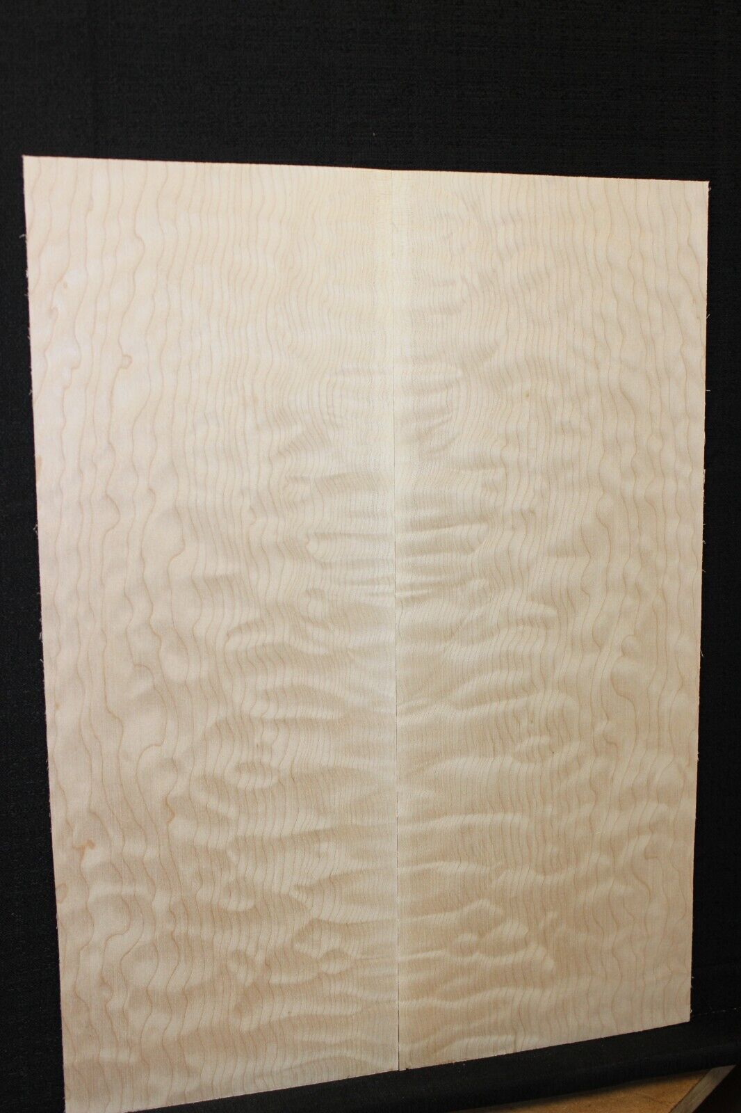 Quilted maple book matched guitar drop top.